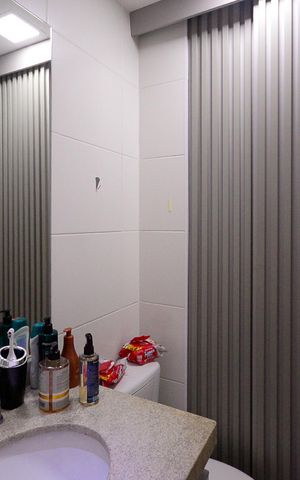 Apartamento à venda com 57m², 2 quartos e 1 vaga Apartamento à venda com 57m², 2 quartos e 1 vagaBanheiro Social