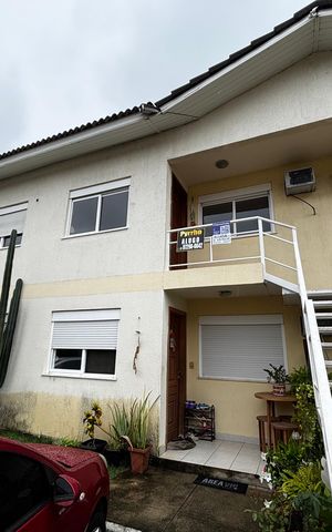 Casa de condomínio para alugar com 57m², 2 quartos e 1 vaga Casa de condomínio para alugar com 57m², 2 quartos e 1 vagaFachada