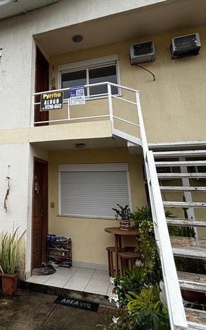 Casa de condomínio para alugar com 57m², 2 quartos e 1 vaga Casa de condomínio para alugar com 57m², 2 quartos e 1 vagaFachada