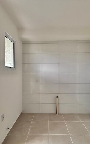 Apartamento à venda com 51m², 2 quartos e 1 vaga Apartamento à venda com 51m², 2 quartos e 1 vagaCozinha e Área de Serviço