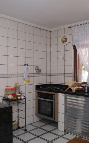 Casa à venda com 110m², 2 quartos e 2 vagasCozinha