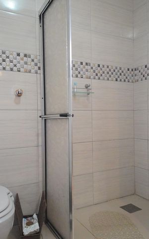 Casa à venda com 251m², 4 quartos e 4 vagasBanheiro 1