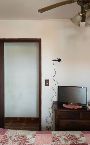 Casa à venda com 255m², 5 quartos e 5 vagasCasa 02/ Quarto 01  com Varanda 