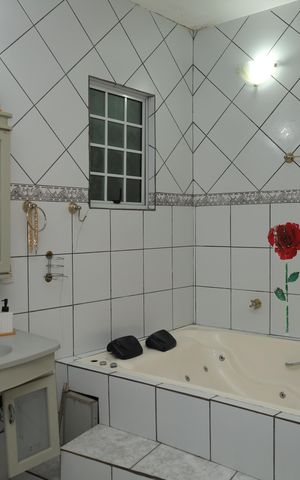 Casa para alugar com 170m², 4 quartos e 4 vagasBanheiro 1 - Suíte