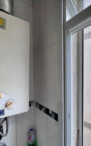 Apartamento à venda com 360m², 3 quartos e 3 vagas Apartamento à venda com 360m², 3 quartos e 3 vagasCozinha e Área de Serviço