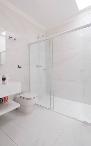 Casa à venda com 261m², 4 quartos e 4 vagasBanheiro 2