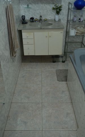 Casa à venda com 320m², 5 quartos e 4 vagasBanheiro da Suíte 1