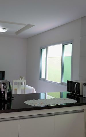 Casa à venda com 162m², 4 quartos e 4 vagas Casa à venda com 162m², 4 quartos e 4 vagasCozinha