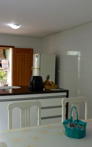 Casa à venda com 162m², 4 quartos e 4 vagas Casa à venda com 162m², 4 quartos e 4 vagasCozinha