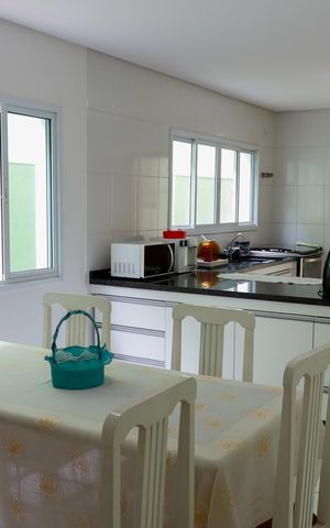 Casa à venda com 162m², 4 quartos e 4 vagas Casa à venda com 162m², 4 quartos e 4 vagasCozinha