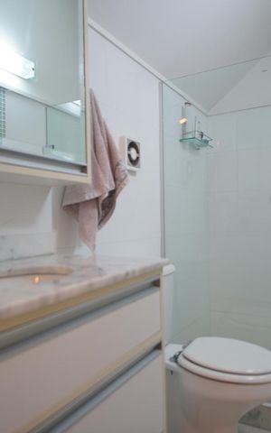 Casa de condomínio à venda com 200m², 3 quartos e 2 vagasBanheiro da Suíte