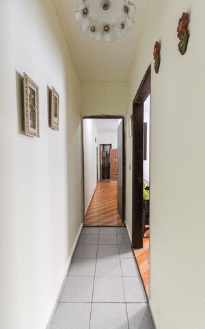 Casa à venda com 74m², 3 quartos e 2 vagasCorredor