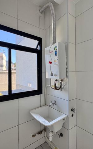 Apartamento à venda com 52m², 2 quartos e sem vaga Apartamento à venda com 52m², 2 quartos e sem vagaCozinha e Área de Serviço