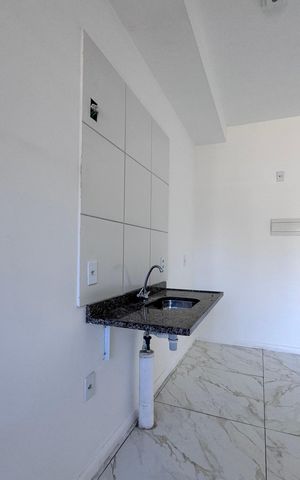 Apartamento à venda com 52m², 2 quartos e sem vaga Apartamento à venda com 52m², 2 quartos e sem vagaCozinha e Área de Serviço