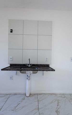 Apartamento à venda com 52m², 2 quartos e sem vaga Apartamento à venda com 52m², 2 quartos e sem vagaCozinha e Área de Serviço