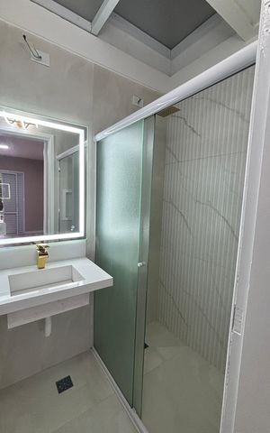 Casa de condomínio à venda com 144m², 4 quartos e 3 vagas Casa de condomínio à venda com 144m², 4 quartos e 3 vagasBanheiro da Suíte
