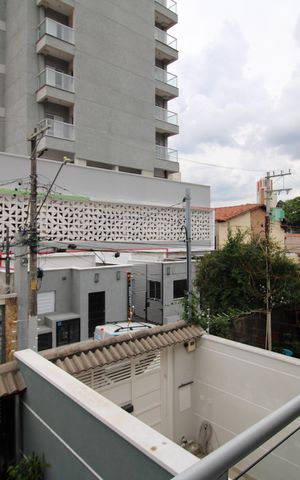 Casa à venda com 129m², 3 quartos e 2 vagasQuarto 2 - Varanda