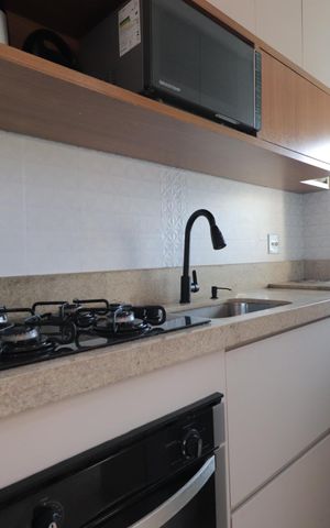 Apartamento à venda com 46m², 2 quartos e 1 vagaCozinha e Área de Serviço