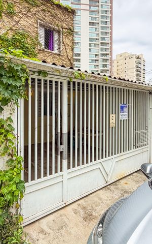 Casa à venda com 240m², 4 quartos e 2 vagas Casa à venda com 240m², 4 quartos e 2 vagasFachada