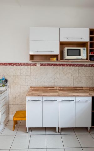 Casa à venda com 240m², 4 quartos e 2 vagas Casa à venda com 240m², 4 quartos e 2 vagasCozinha