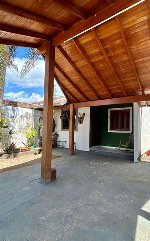 Casa à venda com 60m², 2 quartos e 2 vagas Casa à venda com 60m², 2 quartos e 2 vagasFachada