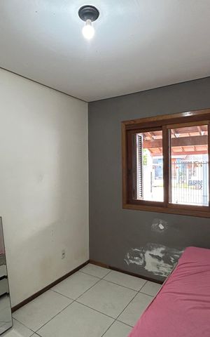 Casa à venda com 60m², 2 quartos e 2 vagas Casa à venda com 60m², 2 quartos e 2 vagasQuarto 1