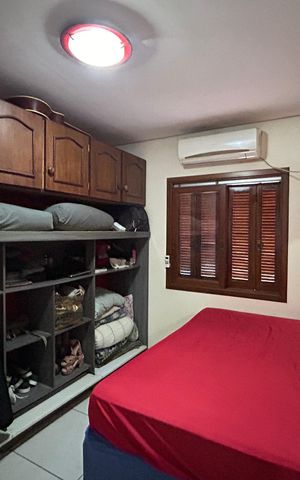 Casa à venda com 60m², 2 quartos e 2 vagas Casa à venda com 60m², 2 quartos e 2 vagasQuarto 2
