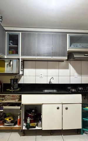 Casa à venda com 60m², 2 quartos e 2 vagas Casa à venda com 60m², 2 quartos e 2 vagasCozinha