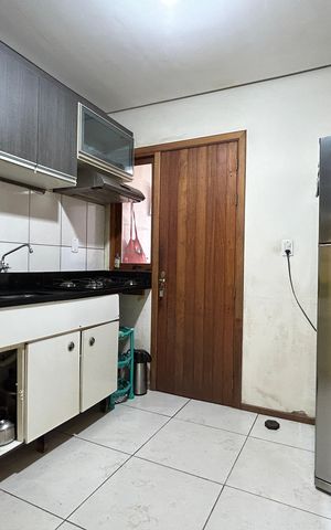 Casa à venda com 60m², 2 quartos e 2 vagas Casa à venda com 60m², 2 quartos e 2 vagasCozinha