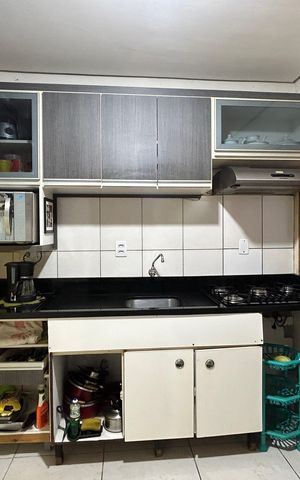 Casa à venda com 60m², 2 quartos e 2 vagas Casa à venda com 60m², 2 quartos e 2 vagasCozinha