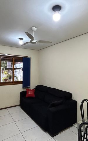 Casa à venda com 60m², 2 quartos e 2 vagas Casa à venda com 60m², 2 quartos e 2 vagasSala