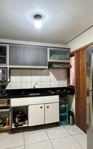 Casa à venda com 60m², 2 quartos e 2 vagas Casa à venda com 60m², 2 quartos e 2 vagasCozinha