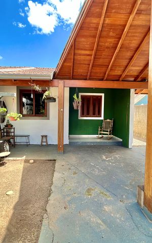 Casa à venda com 60m², 2 quartos e 2 vagas Casa à venda com 60m², 2 quartos e 2 vagasFachada