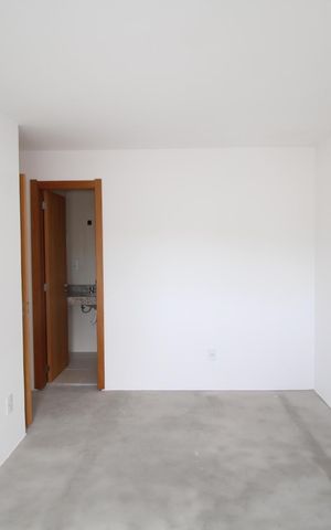Apartamento à venda com 64m², 2 quartos e 2 vagasSuíte 1