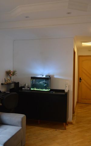 Apartamento à venda com 90m², 2 quartos e 2 vagasSala