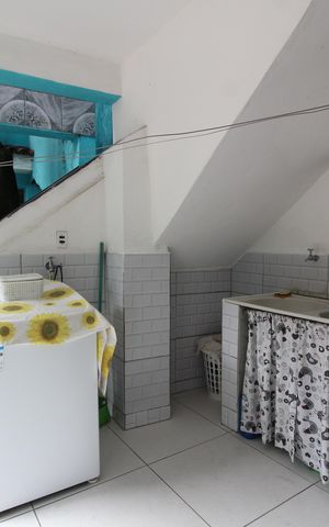 Casa à venda com 200m², 4 quartos e 1 vagaÁrea de Serviço