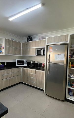 Casa à venda com 120m², 3 quartos e 3 vagas Casa à venda com 120m², 3 quartos e 3 vagasCozinha - Armários