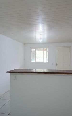 Casa à venda com 80m², 2 quartos e 2 vagasCozinha - Sala