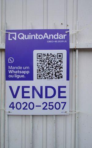 Casa à venda com 80m², 2 quartos e 2 vagasPlaca na Fachada