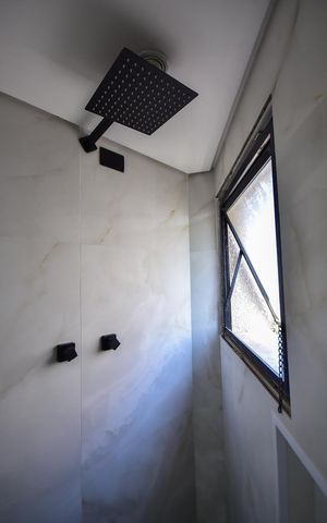 Apartamento para alugar com 228m², 3 quartos e 4 vagasChuveiro do Banheiro da Suíte 2