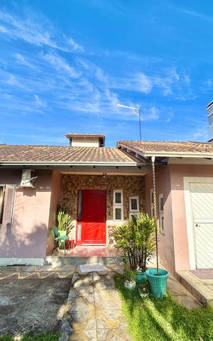 Casa à venda com 113m², 3 quartos e 2 vagas Casa à venda com 113m², 3 quartos e 2 vagasFachada