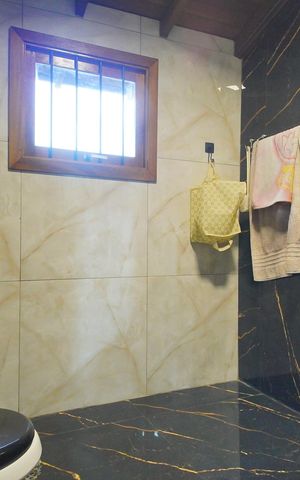 Casa à venda com 120m², 3 quartos e 3 vagasBanheiro da Suíte 1