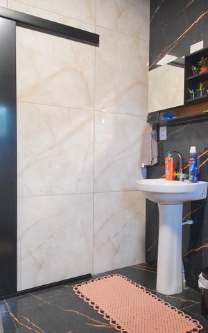 Casa à venda com 120m², 3 quartos e 3 vagasBanheiro da Suíte 1
