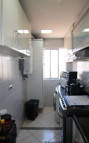 Apartamento à venda com 105m², 2 quartos e 2 vagasCozinha