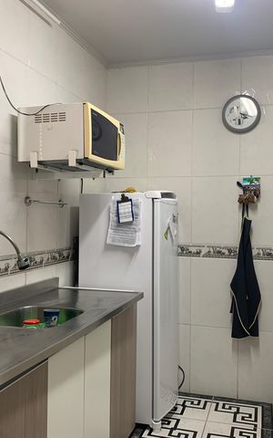 Apartamento para alugar com 93m², 2 quartos e sem vagaCozinha 