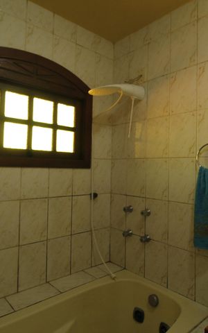Casa à venda com 321m², 5 quartos e 2 vagasBanheiro da Suíte 1