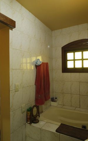 Casa à venda com 321m², 5 quartos e 2 vagasBanheiro da Suíte 1