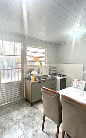 Casa à venda com 200m², 3 quartos e 3 vagas Casa à venda com 200m², 3 quartos e 3 vagasCozinha