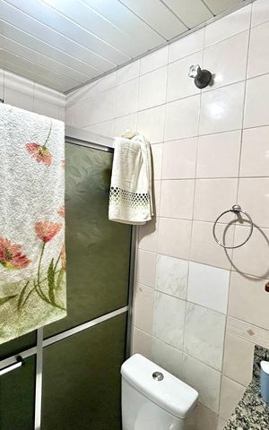 Casa à venda com 200m², 3 quartos e 3 vagas Casa à venda com 200m², 3 quartos e 3 vagasBanheiro 1