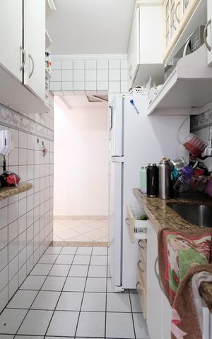 Casa à venda com 58m², 3 quartos e 1 vagaCozinha e Área de Serviço